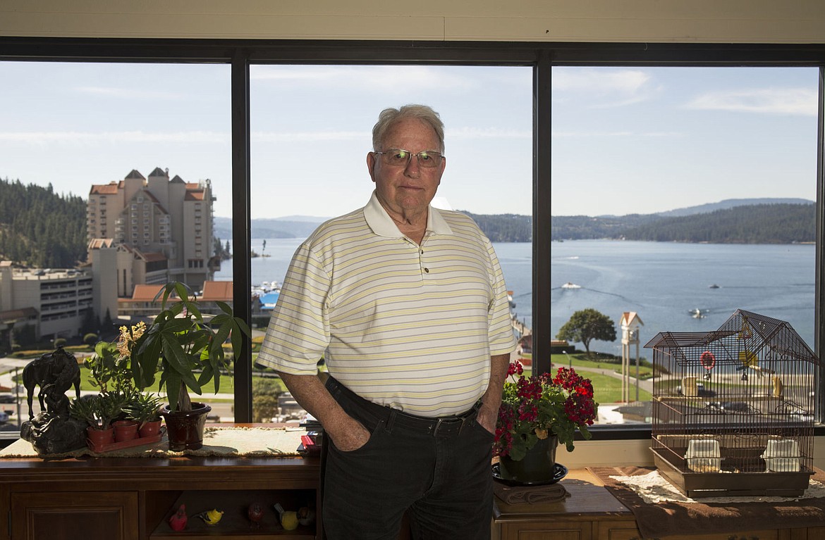 &lt;p&gt;Community volunteer and long-time photographer Don Sausser has a birds-eye view of the lake and downtown Coeur d'Alene from his 10th floor Lake Tower Apartment and is photographed here inside his apartment on Aug. 12, 2016.&lt;/p&gt;