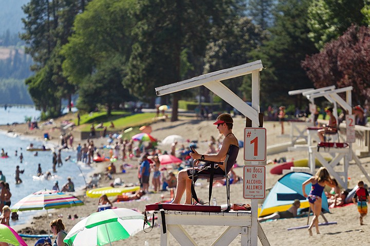 &lt;p&gt;SHAWN GUST/Press Travis Griffard, assistant head lifeguard, mans his perch over beachgoers Friday at the city beach at Lake Coeur d'Alene. The 12 lifeguards employed by the city will end their seasonal jobs Monday, August 20.&lt;/p&gt;