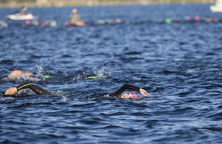 &lt;p&gt;LOREN BENOIT/Press More than 1,300 athletes from around the world gathered on Coeur d'Alene's City Beach on the morning of August 21, 2016 for the start of the 14th annual Ironman Coeur d'Alene triathlon. Participants were challenged to a 2.4-mile open water swim in Lake Coeur d'Alene, followed by a 122-mile bike ride and finishing the race with a 26.2-mile run. Thousands of spectators cheered on the athletes as they raced through the 94-degree weather for the event.&lt;/p&gt;