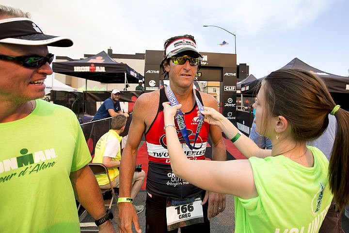 &lt;p&gt;JAKE PARRISH/Press Greg Gervais of Coeur d'Alene recieves his finisher medal after completing the Ironman Coeur d'Alene triathlon in ten hours, 40 minutes and 41 seconds.&lt;/p&gt;