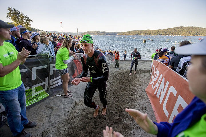 &lt;p&gt;More than 1,300 athletes from around the world gathered on Coeur d'Alene's City Beach on the morning of August 21, 2016 for the start of the 14th annual Ironman Coeur d'Alene triathlon. Participants were challenged to a 2.4-mile open water swim in Lake Coeur d'Alene, followed by a 122-mile bike ride and finishing the race with a 26.2-mile run. Thousands of spectators cheered on the athletes as they raced through the 94-degree weather for the event. To purchase photo, please visit www.cdapress.com/photos&lt;/p&gt;