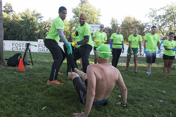 &lt;p&gt;More than 1,300 athletes from around the world gathered on Coeur d'Alene's City Beach on the morning of August 21, 2016 for the start of the 14th annual Ironman Coeur d'Alene triathlon. Participants were challenged to a 2.4-mile open water swim in Lake Coeur d'Alene, followed by a 122-mile bike ride and finishing the race with a 26.2-mile run. Thousands of spectators cheered on the athletes as they raced through the 94-degree weather for the event. To purchase photo, please visit www.cdapress.com/photos&lt;/p&gt;