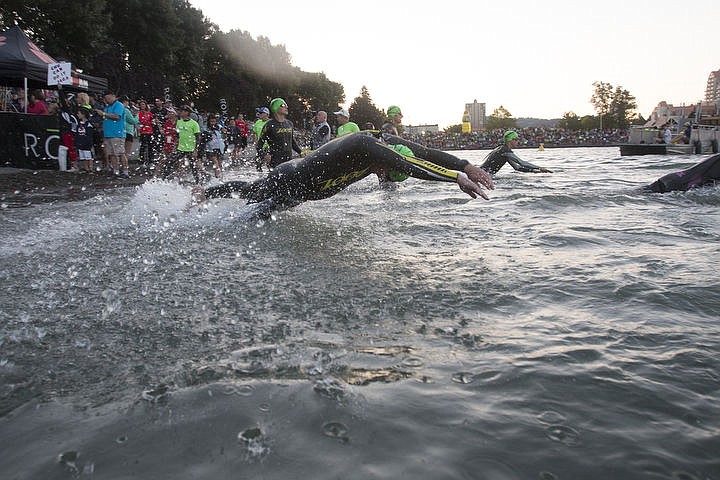 &lt;p&gt;More than 1,300 athletes from around the world gathered on Coeur d'Alene's City Beach on the morning of August 21, 2016 for the start of the 14th annual Ironman Coeur d'Alene triathlon. Participants were challenged to a 2.4-mile open water swim in Lake Coeur d'Alene, followed by a 122-mile bike ride and finishing the race with a 26.2-mile run. Thousands of spectators cheered on the athletes as they raced through the 94-degree weather for the event. To purchase photo, please visit www.cdapress.com/photos&lt;/p&gt;