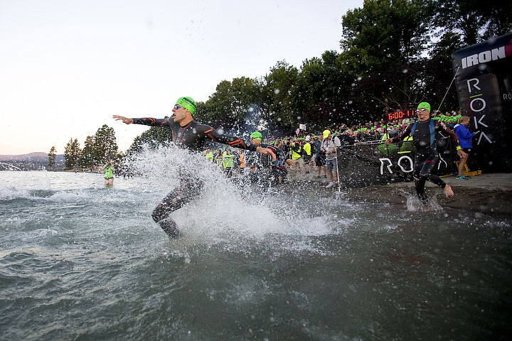 &lt;p&gt;More than 1,300 athletes from around the world gathered on Coeur d'Alene's City Beach on the morning of August 21, 2016 for the start of the 14th annual Ironman Coeur d'Alene triathlon. Participants were challenged to a 2.4-mile open water swim in Lake Coeur d'Alene, followed by a 122-mile bike ride and finishing the race with a 26.2-mile run. Thousands of spectators cheered on the athletes as they raced through the 94-degree weather for the event. To purchase photo, please visit www.cdapress.com/photos&lt;/p&gt;