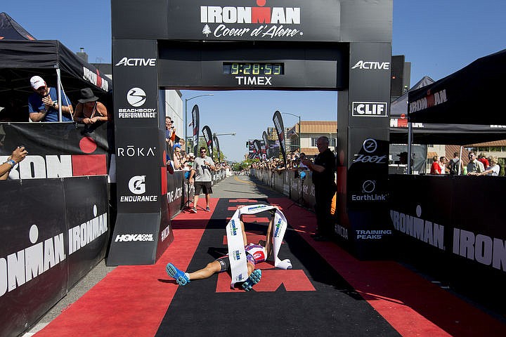 &lt;p&gt;Ironman Coeur d'Alene first-place male finisher Kevin Portmann celebrates after crossing the finish line on Sunday, August 21, 2016.&lt;/p&gt;