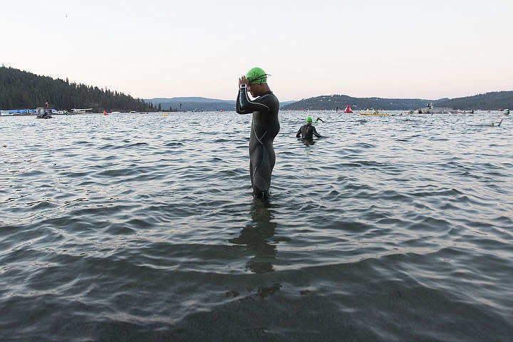 &lt;p&gt;More than 1,300 athletes from around the world gathered on Coeur d'Alene's City Beach on the morning of August 21, 2016 for the start of the 14th annual Ironman Coeur d'Alene triathlon. Participants were challenged to a 2.4-mile open water swim in Lake Coeur d'Alene, followed by a 122-mile bike ride and finishing the race with a 26.2-mile run. Thousands of spectators cheered on the athletes as they raced through the 94-degree weather for the event. To purchase photo, please visit www.cdapress.com/photos&lt;/p&gt;