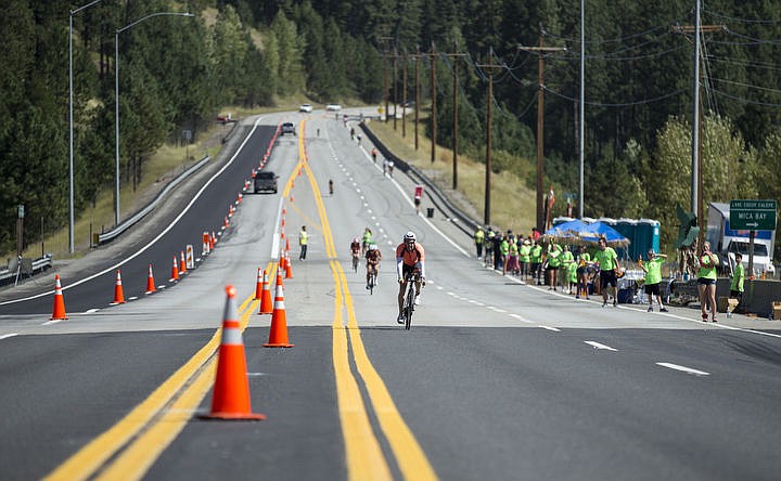 &lt;p&gt;LOREN BENOIT/Press More than 1,300 athletes from around the world gathered on Coeur d'Alene's City Beach on the morning of August 21, 2016 for the start of the 14th annual Ironman Coeur d'Alene triathlon. Participants were challenged to a 2.4-mile open water swim in Lake Coeur d'Alene, followed by a 122-mile bike ride and finishing the race with a 26.2-mile run. Thousands of spectators cheered on the athletes as they raced through the 94-degree weather for the event.&lt;/p&gt;