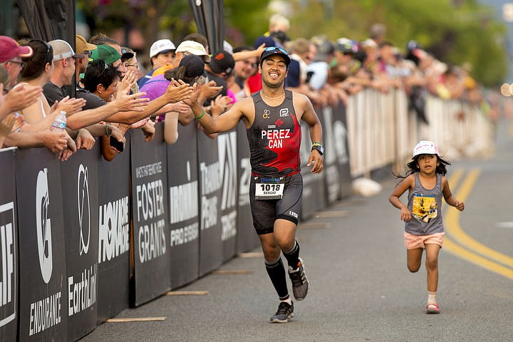 &lt;p&gt;More than 1,300 athletes from around the world gathered on Coeur d'Alene's City Beach on the morning of August 21, 2016 for the start of the 14th annual Ironman Coeur d'Alene triathlon. Participants were challenged to a 2.4-mile open water swim in Lake Coeur d'Alene, followed by a 122-mile bike ride and finishing the race with a 26.2-mile run. Thousands of spectators cheered on the athletes as they raced through the 94-degree weather for the event. To purchase photo, please visit www.cdapress.com/photos&lt;/p&gt;