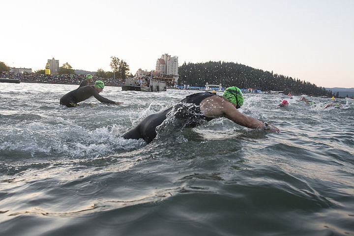 &lt;p&gt;More than 1,300 athletes from around the world gathered on Coeur d'Alene's City Beach on the morning of August 21, 2016 for the start of the 14th annual Ironman Coeur d'Alene triathlon. Participants were challenged to a 2.4-mile open water swim in Lake Coeur d'Alene, followed by a 122-mile bike ride and finishing the race with a 26.2-mile run. Thousands of spectators cheered on the athletes as they raced through the 94-degree weather for the event. To purchase photo, please visit www.cdapress.com/photos&lt;/p&gt;