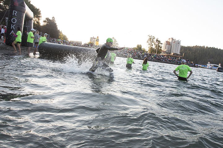 &lt;p&gt;More than 1,300 athletes from around the world gathered on Coeur d'Alene's City Beach on the morning of August 21, 2016 for the start of the 14th annual Ironman Coeur d'Alene triathlon. Participants were challenged to a 2.4-mile open water swim in Lake Coeur d'Alene, followed by a 122-mile bike ride and finishing the race with a 26.2-mile run. Thousands of spectators cheered on the athletes as they raced through the 94-degree weather for the event. To purchase photo, please visit www.cdapress.com/photos&lt;/p&gt;