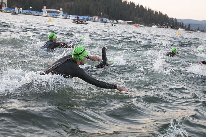 &lt;p&gt;More than 1,300 athletes from around the world gathered on Coeur d'Alene's City Beach on the morning of August 21, 2016 for the start of the 14th annual Ironman Coeur d'Alene triathlon. Participants were challenged to a 2.4-mile open water swim in Lake Coeur d'Alene, followed by a 122-mile bike ride and finishing the race with a 26.2-mile run. Thousands of spectators cheered on the athletes as they raced through the 94-degree weather for the event. To purchase photo, please visit www.cdapress.com/photos&lt;/p&gt;