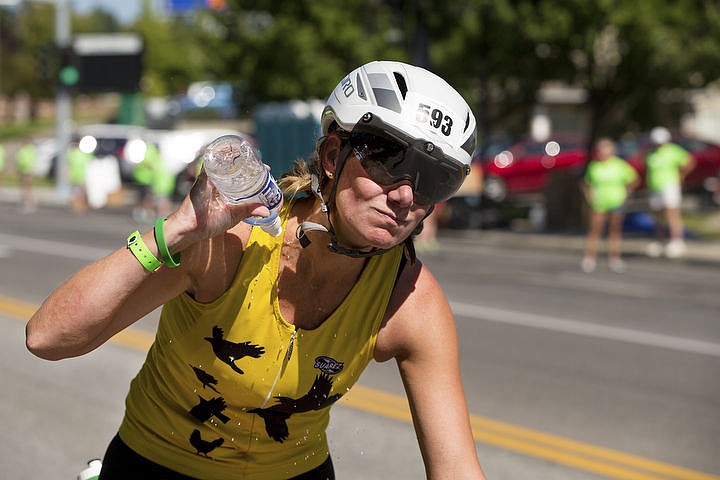 &lt;p&gt;More than 1,300 athletes from around the world gathered on Coeur d'Alene's City Beach on the morning of August 21, 2016 for the start of the 14th annual Ironman Coeur d'Alene triathlon. Participants were challenged to a 2.4-mile open water swim in Lake Coeur d'Alene, followed by a 122-mile bike ride and finishing the race with a 26.2-mile run. Thousands of spectators cheered on the athletes as they raced through the 94-degree weather for the event. To purchase photo, please visit www.cdapress.com/photos&lt;/p&gt;