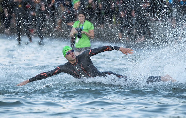 &lt;p&gt;LOREN BENOIT/Press More than 1,300 athletes from around the world gathered on Coeur d'Alene's City Beach on the morning of August 21, 2016 for the start of the 14th annual Ironman Coeur d'Alene triathlon. Participants were challenged to a 2.4-mile open water swim in Lake Coeur d'Alene, followed by a 122-mile bike ride and finishing the race with a 26.2-mile run. Thousands of spectators cheered on the athletes as they raced through the 94-degree weather for the event.&lt;/p&gt;