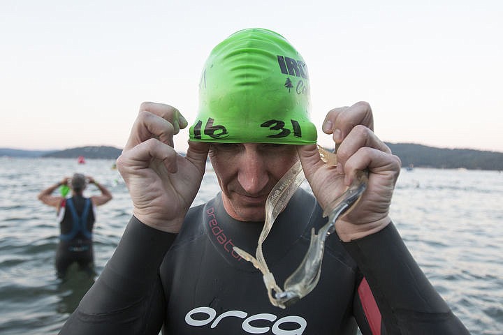 &lt;p&gt;More than 1,300 athletes from around the world gathered on Coeur d'Alene's City Beach on the morning of August 21, 2016 for the start of the 14th annual Ironman Coeur d'Alene triathlon. Participants were challenged to a 2.4-mile open water swim in Lake Coeur d'Alene, followed by a 122-mile bike ride and finishing the race with a 26.2-mile run. Thousands of spectators cheered on the athletes as they raced through the 94-degree weather for the event. To purchase photo, please visit www.cdapress.com/photos&lt;/p&gt;