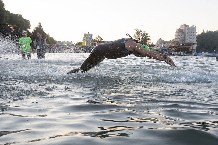 &lt;p&gt;More than 1,300 athletes from around the world gathered on Coeur d'Alene's City Beach on the morning of August 21, 2016 for the start of the 14th annual Ironman Coeur d'Alene triathlon. Participants were challenged to a 2.4-mile open water swim in Lake Coeur d'Alene, followed by a 122-mile bike ride and finishing the race with a 26.2-mile run. Thousands of spectators cheered on the athletes as they raced through the 94-degree weather for the event. To purchase photo, please visit www.cdapress.com/photos&lt;/p&gt;