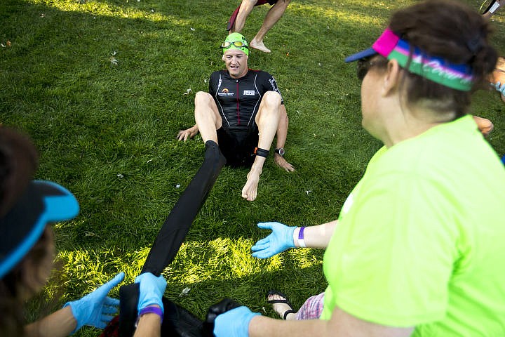 &lt;p&gt;More than 1,300 athletes from around the world gathered on Coeur d'Alene's City Beach on the morning of August 21, 2016 for the start of the 14th annual Ironman Coeur d'Alene triathlon. Participants were challenged to a 2.4-mile open water swim in Lake Coeur d'Alene, followed by a 122-mile bike ride and finishing the race with a 26.2-mile run. Thousands of spectators cheered on the athletes as they raced through the 94-degree weather for the event. To purchase photo, please visit www.cdapress.com/photos&lt;/p&gt;