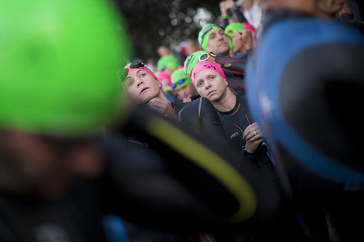 &lt;p&gt;More than 1,300 athletes from around the world gathered on Coeur d'Alene's City Beach on the morning of August 21, 2016 for the start of the 14th annual Ironman Coeur d'Alene triathlon. Participants were challenged to a 2.4-mile open water swim in Lake Coeur d'Alene, followed by a 122-mile bike ride and finishing the race with a 26.2-mile run. Thousands of spectators cheered on the athletes as they raced through the 94-degree weather for the event. To purchase photo, please visit www.cdapress.com/photos&lt;/p&gt;