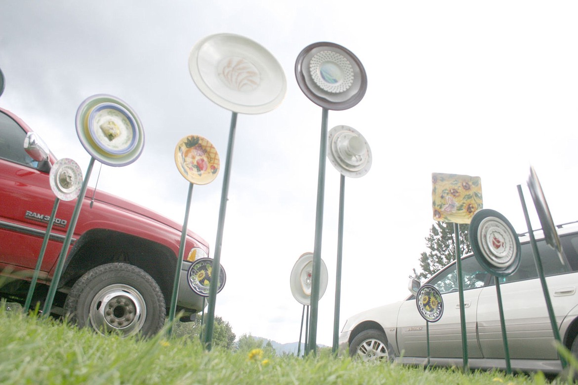 &lt;p&gt;Decorative plates adorn the park in St. Regis as part of the fall flea market put on by the local community council.&lt;/p&gt;