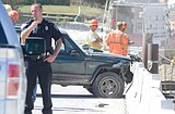 Police chase ends with wreck on temporary bridge