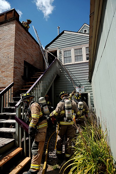 <p>Firefighters from Whitefish, Kalispell and Evergreen were at the scene of a structure fire on Wednesday, August 15, at 128 Central Avenue in Whitefish.</p>