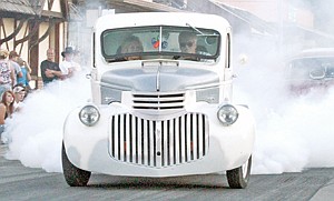 &lt;p&gt;Vance McMillan and Jeanette Fincher of Kalispell lay rubber Friday night in a 1941 Chevy pickup.&lt;/p&gt;
