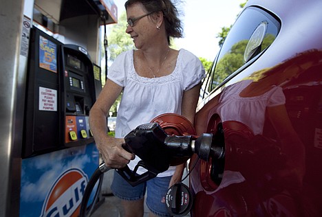 &lt;p&gt;FILE - In this July 10, 2012 file photo, Suzanne Meredith, of Walpole, Mass., gases up her car at a Gulf station in Brookline, Mass. Gasoline is at $3.50 per gallon for the first time this summer after a sharp run-up in July. The price of gas rose 17 cents per gallon, or 5.1 percent this month, as oil rose and drivers burned more fuel on summer road trips. It was the first monthly increase since March, and the biggest gain in any July since auto club AAA started keeping records in 2000. (AP Photo/Steven Senne, File)&lt;/p&gt;