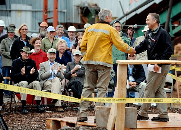 <p>Stoltze Vice President Chuck Roady, right, shakes hands with Montana State Forester Bob Harrington on Tuesday.</p>
<p> </p>