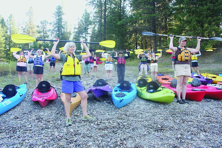 &lt;p&gt;Participants in the Saturday morning class practice their hand positioning before hitting the water.&lt;/p&gt;