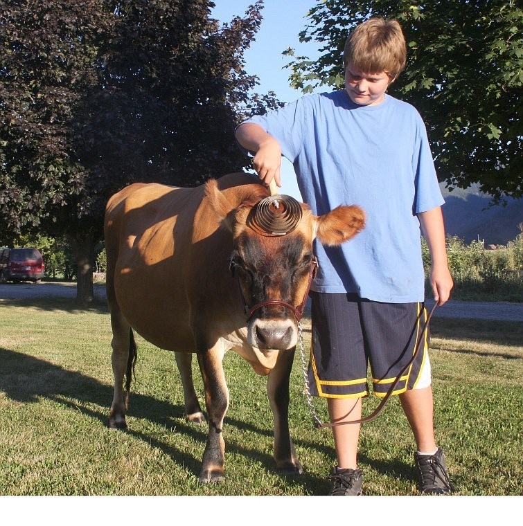 &lt;p&gt;Riley Riffle, 11, with his three-year-old Jersey cow, Pixie.&lt;/p&gt;