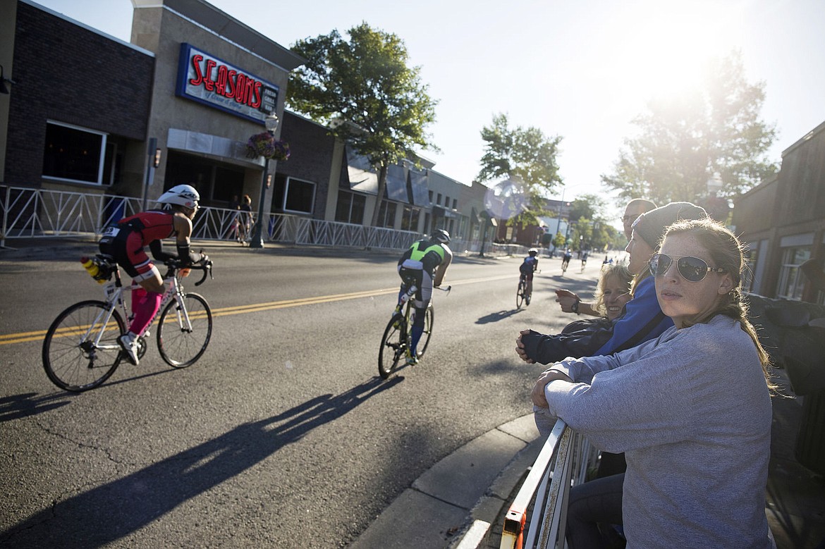 &lt;p&gt;LOREN BENOIT/Press Kelsey O'Haver watches bikers wiz by Seasons of Coeur d'Alene during Ironman Coeur d'Alene on Sunday.&lt;/p&gt;