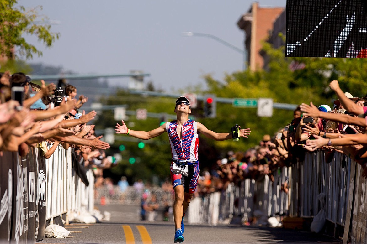 &lt;p&gt;JAKE PARRISH/Press Kevin Portmann of Carlsbad, Calif. takes his final steps of Ironman Coeur d'Alene as he approaches the finish line with a time of nine hours, 28 minutes and 29 seconds, making him the top finisher of the triathlon.&lt;/p&gt;