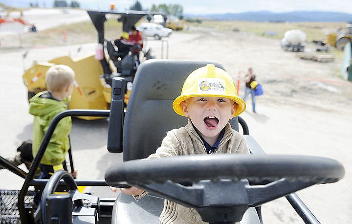 &lt;p&gt;Two-year-old Maverick Bench grabs the steering wheel of a paver during the Community Action Partnership of Northwest Montana's Gravelpalooza at the LHC gravel pit in Kalispell. Children got to help drive about 20 pieces of heavy equipment during the fundraiser. &quot;There are a lot of excited kids,&quot; said LHC owner Jeff Claridge. &quot;They love it. They just love it. And the adults love it too.&quot; (Aaric Bryan/Daily Inter Lake)&lt;/p&gt;