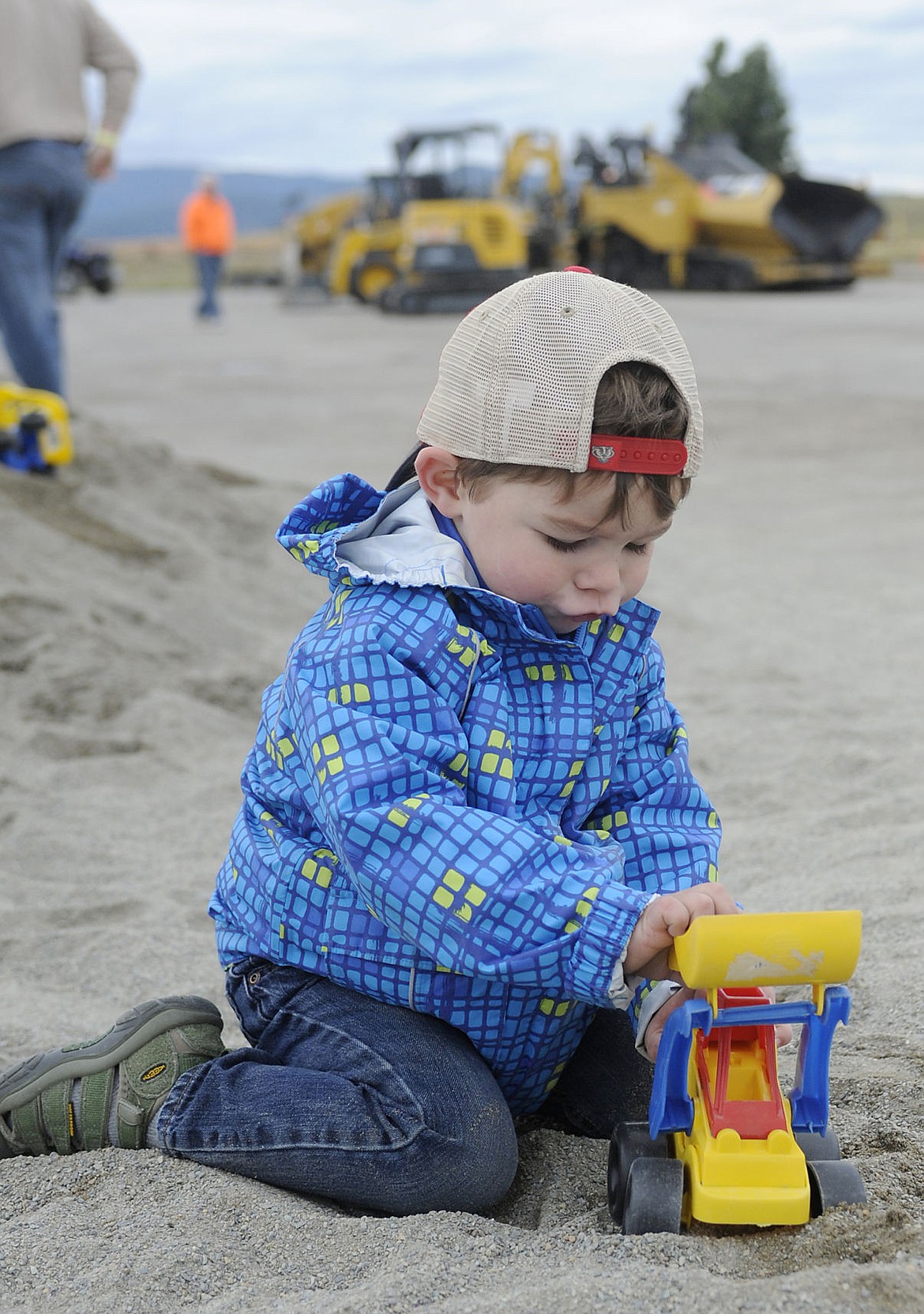 &lt;p&gt;Two-year-old Solomon Kroll makes tractor noises as he plays in a sandpile at Gravelpalooza at the LHC gravel pit. (Aaric Bryan/Daily Inter Lake)&lt;/p&gt;