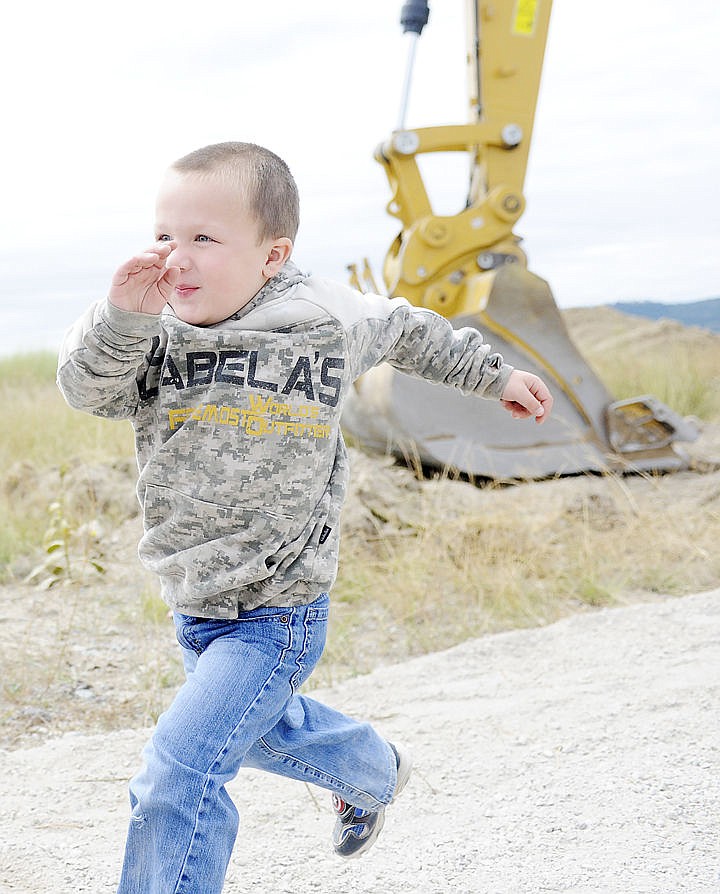 &lt;p&gt;Colton Engeland, 5, is too excited to walk and starts to run after help drive an excavator. (Aaric Bryan/Daily Inter Lake)&lt;/p&gt;