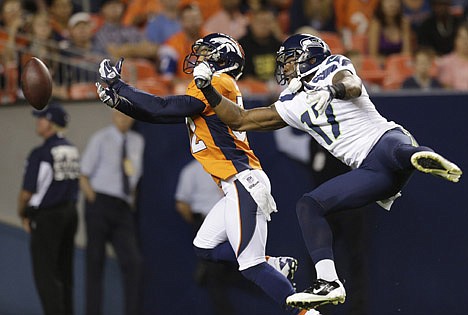 &lt;p&gt;Denver Broncos' Tony Carter, left, and Seattle Seahawks' Braylon Edwards battle for an incomplete pass in the second half of an NFL football preseason game on Saturday, Aug. 18, 2012, in Denver. (AP Photo/Joe Mahoney)&lt;/p&gt;