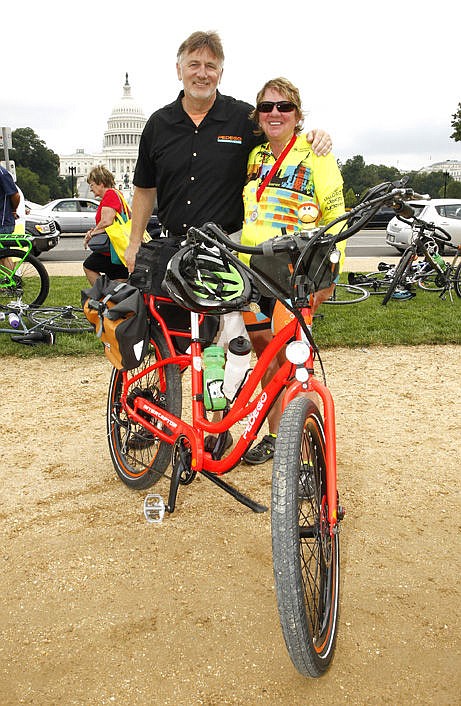 &lt;p&gt;Pedego Electric Bikes CEO and co-founder Don DiCostanzo, left, with Cathy Rogers, 57, who arrived on Saturday, August 2, 2014 in Washington, D.C. after pedaling 3,300 miles in just 48 days from Redmond, Wash., to D.C.&lt;/p&gt;