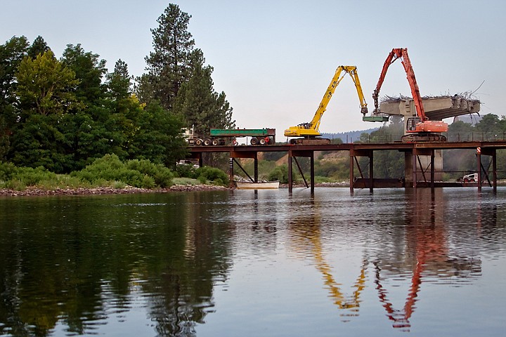 &lt;p&gt;JEROME A. POLLOS/Press Heavy machinery tears apart one of the concrete supports of the 71-year-old Appleway bridge Wednesday at Stateline. Construction crews assembled a temporary bridge to work off of over the Spokane River. The new bridge is expected to be completed by spring of 2012.&lt;/p&gt;