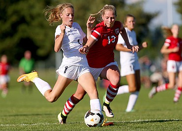 <p>JAKE PARRISH/Press Lake City junior Tiana Cydell (1) steals the ball from Sandpoint sophomore Mya Darling on Tuesday at Lake City High School.</p>