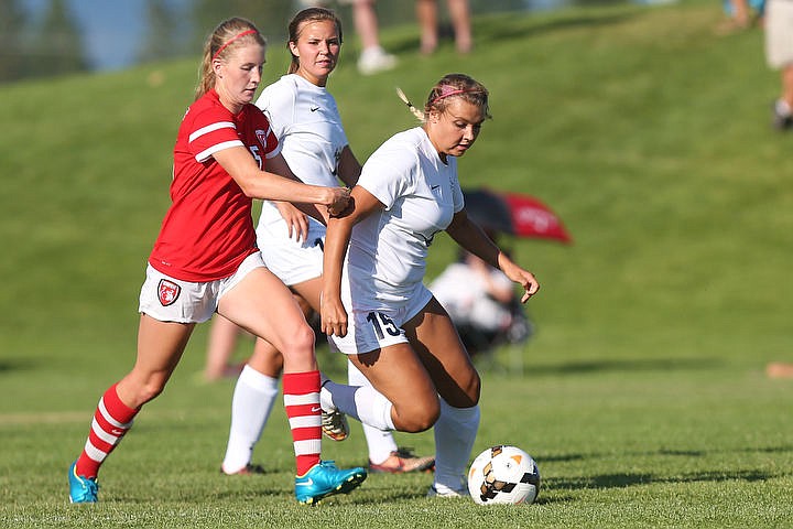 &lt;p&gt;The Lake City Timberwolves duke it out with the Sandpoint Bulldogs in girls soccer on Tuesday, Aug. 23, 2016 at Lake City High School. Lake City emerged victorious with a 4-0 win. To purchase photo, please visit www.cdapress.com/photos&lt;/p&gt;