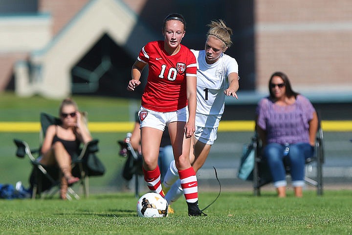 &lt;p&gt;The Lake City Timberwolves duke it out with the Sandpoint Bulldogs in girls soccer on Tuesday, Aug. 23, 2016 at Lake City High School. Lake City emerged victorious with a 4-0 win. To purchase photo, please visit www.cdapress.com/photos&lt;/p&gt;