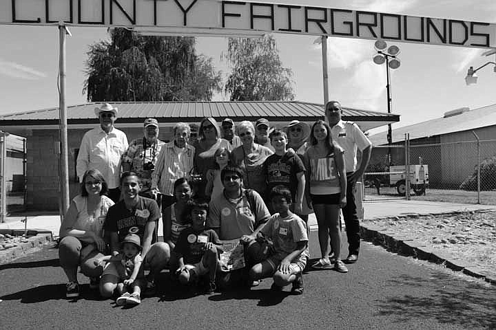 Front row, left to right, airmen and their families: Danielle, Michael and Mathew McCloskey and Sida, Sage, Juan and James Avila.Back row, donors: Larry Godden, Dennis L. Clay, Enid Clay, Garnet Wilson, Nikki Winkler, Jim Turner, Cheryl Elkins (with grandkids Kayla and Dylan), Tom and Peggy Harless (with granddaughter Morgan) and Darrin of Jackson Flight Center.