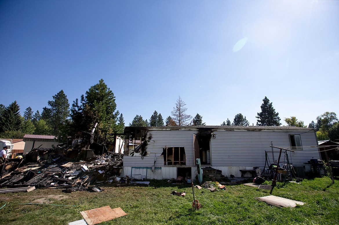 &lt;p&gt;The burned remains of a mobile home on Meadow View Court in Rathdrum are seen following a fire early Tuesday morning. Deputy State Fire Marshall Bill Steele estimates the property suffered at least $50,000 in damages&lt;/p&gt;