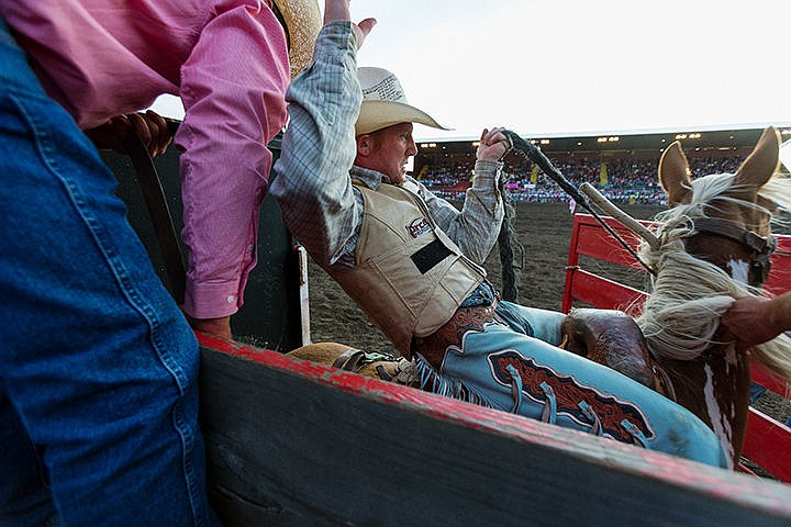 &lt;p&gt;SHAWN GUST/Press&lt;/p&gt;&lt;p&gt;Caleb Nichols, of Priest River, prepares to exit the chute during the saddle bronc riding event at the Professional Rodeo Cowboys Association Friday at the North Idaho Fairgrounds.&lt;/p&gt;