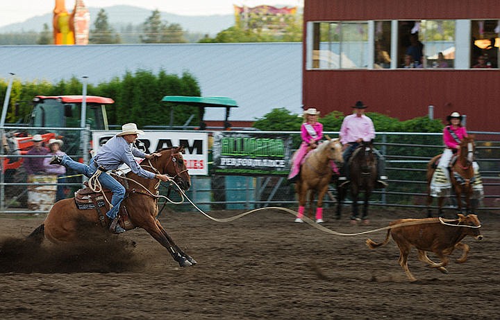 &lt;p&gt;SHAWN GUST/Press&lt;/p&gt;&lt;p&gt;Clif Cooper, of Decatur, Texas, dismounts his horse while roping a calf at the PRCA rodeo.&lt;/p&gt;