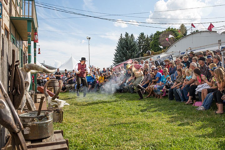 &lt;p&gt;JAKE PARRISH/Press&lt;/p&gt;&lt;p&gt;Wild West Shootout actors &quot;accidentally&quot; fire their revolvers full of blanks during one of three performances Thursday at the North Idaho Fair and Rodeo. Many other acts, including a hypnotist, a magician, and an escape artist, can be seen at the Fair.&lt;/p&gt;