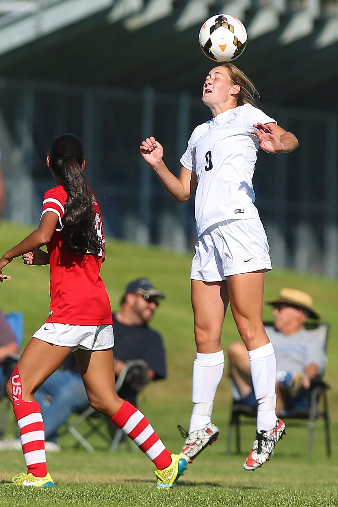 &lt;p&gt;JAKE PARRISH/Press Lake City sophomore Bridget Rieken heads the ball over Sandpoint's Yeo Yarnell on Tuesday at Lake City High School.&lt;/p&gt;