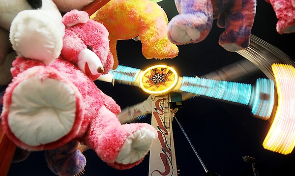 &lt;p&gt;A row of teddy bear prizes makes a frame for the fast-moving
parts of the Kamikaze ride at the Northwest Montana Fair on
Thursday night in Kalispell.&lt;/p&gt;