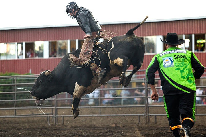 &lt;p&gt;JAKE PARRISH/Press&lt;/p&gt;&lt;p&gt;Guy Nordhal of Helena, Mont. manages to hold onto the bull La Bomba during the Xtreme Bulls rodeo show at the Main Arena during the North Idaho Fair and Rodeo. Every bull in the show is about 1,800 pounds.&lt;/p&gt;