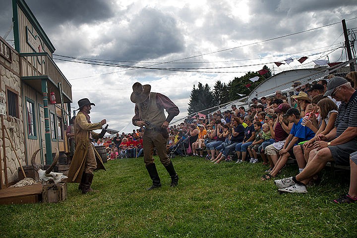 &lt;p&gt;TESS FREEMAN/Press&lt;/p&gt;&lt;p&gt;Walter Dootson, left and Tim Wardell, from the Gunfighters&#160;play the bad guys in their show Tumbleweed Crossing&#160;at the North Idaho Fair and Rodeo on Wednesday afternoon.&lt;/p&gt;