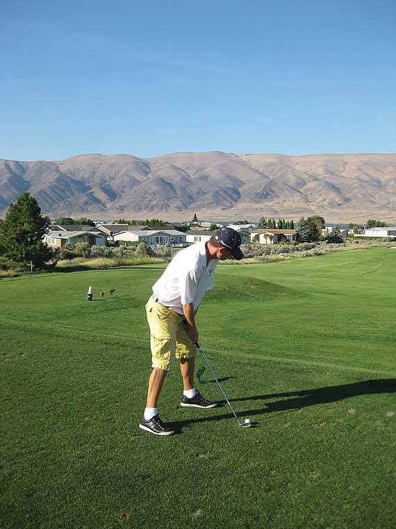 Multiple club champ Jack Eskildsen prepares to tee off on the 163-yard, par-3 No. 6 hole.